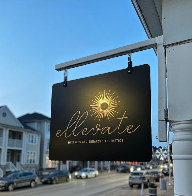 Custom 2D metal blade projecting sign for commercial storefront – signs.inc