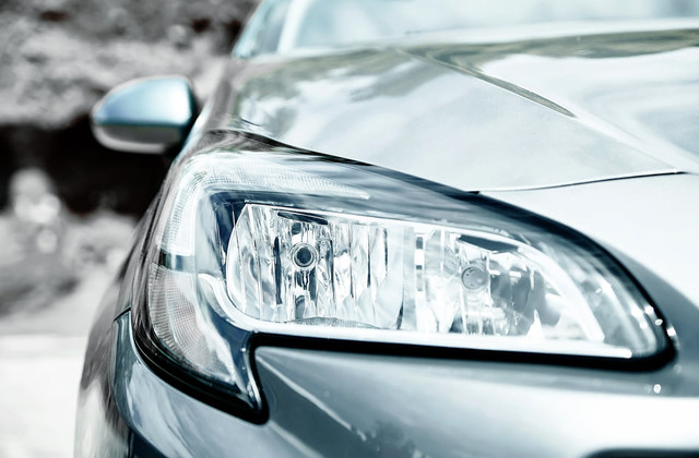 closeup headlights gray car.jpg