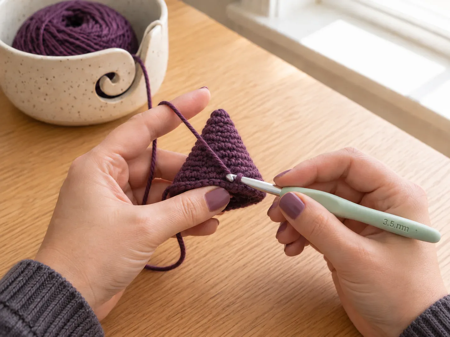 Increase the cone — Add increase rounds gradually so the hat widens while keeping the cone shape.