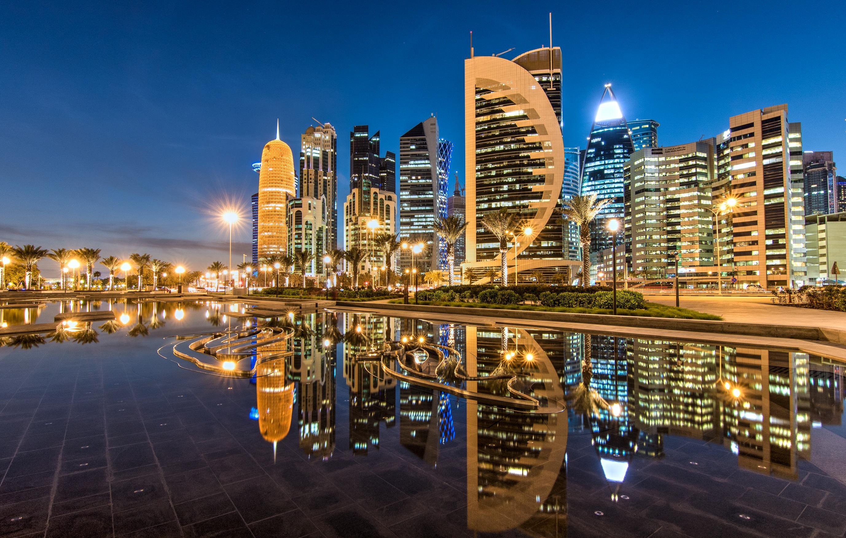 Doha's futuristic West Bay skyline at dusk