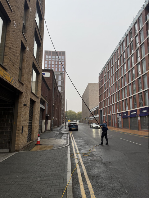 Commercial high-rise window cleaning rope access