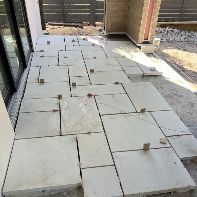 pool deck Cape Coral completed natural stone travertine installation waterfront