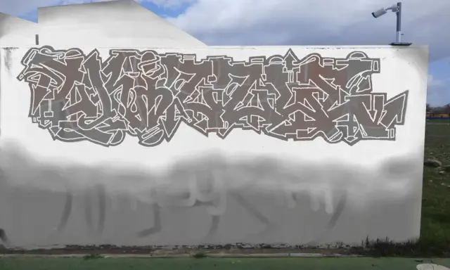 Graffiti artwork by Tkiz