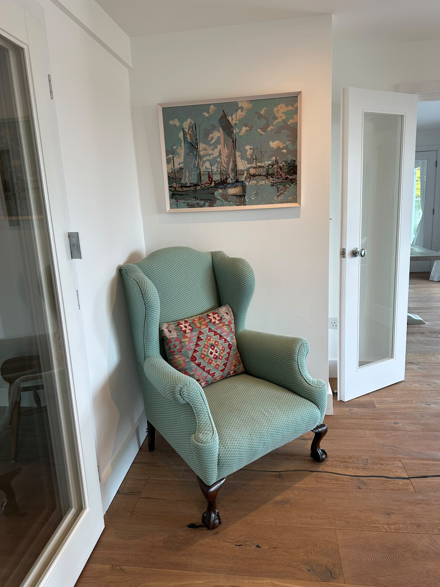 Pondhu teal wingback chair with sailing painting