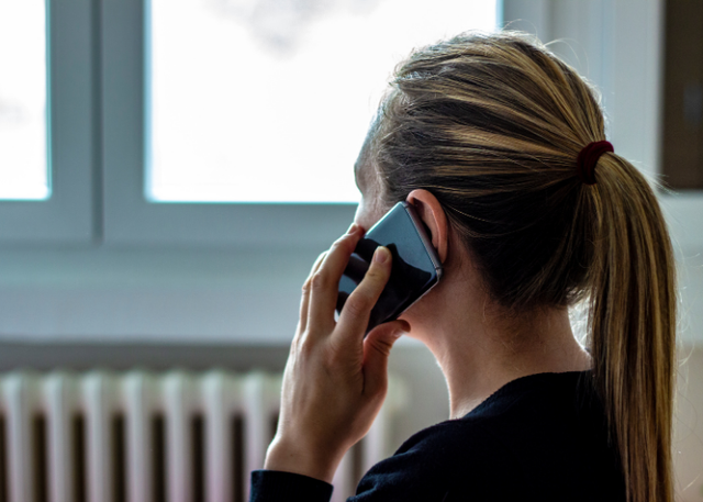 Person making a call to their representative