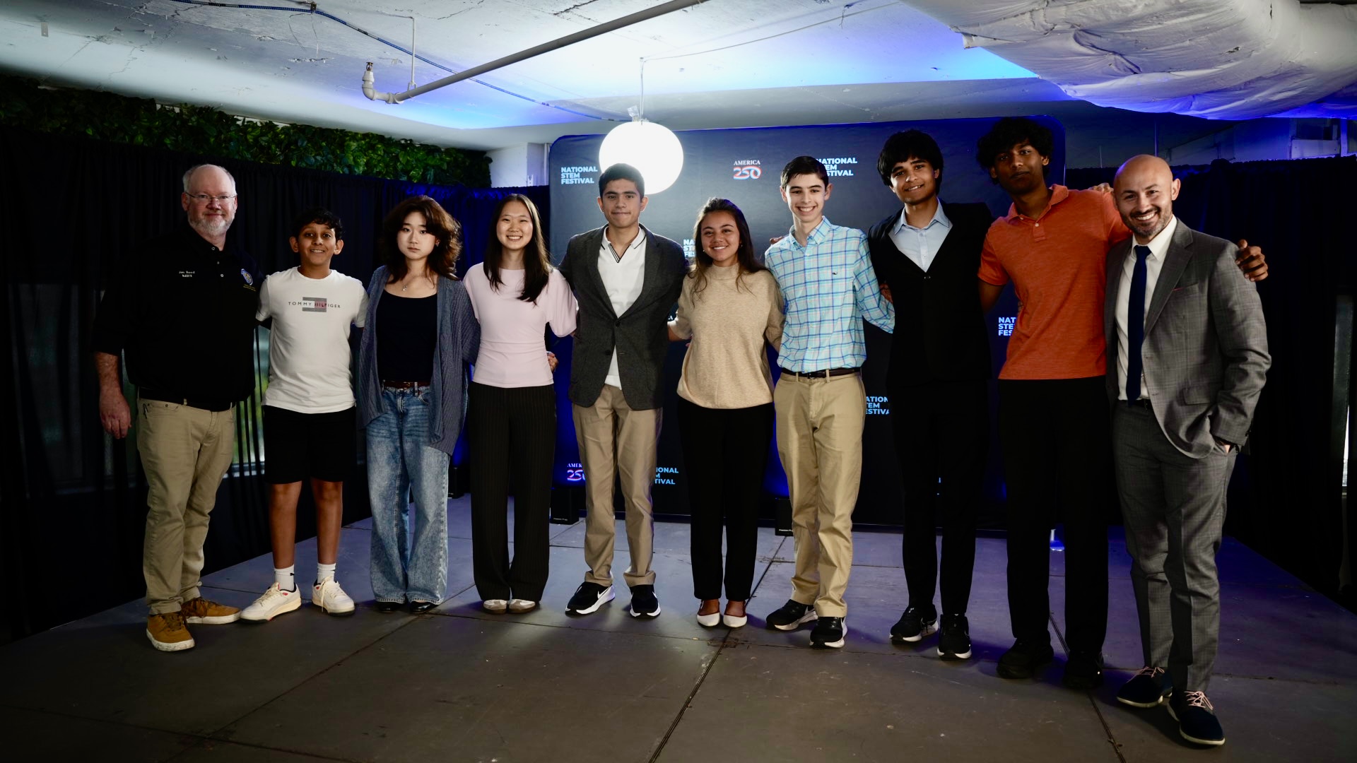 STEM Festival Fellows and National STEM Champions on stage at the National STEM Festival