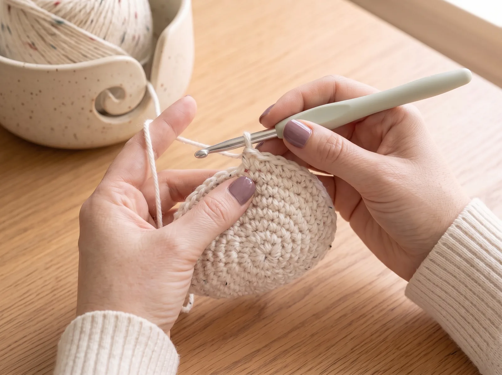 Grow the rounded body — Work increase rounds until the ghost body becomes a smooth rounded shape, then crochet even rounds to build the height.