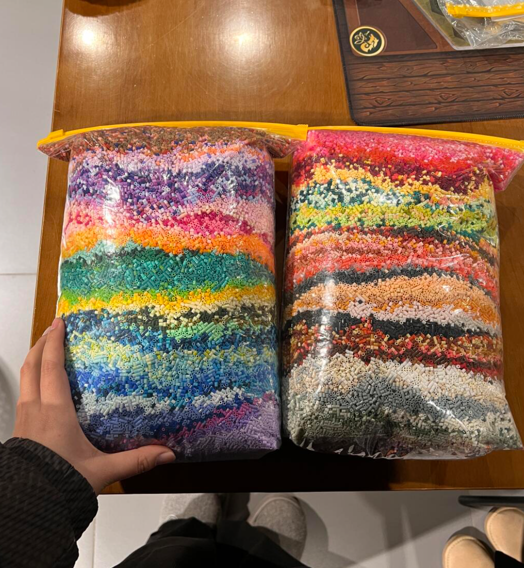 Stop digging through buckets for that one specific shade of red. This guide breaks down the most effective Perler bead storage solutions, from budget-friendly DIY hacks to professional drawer systems, so you can spend more time creating and less time sorting.