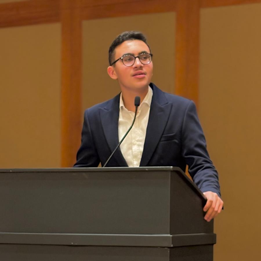 Amir Majdi Alomari at a conference