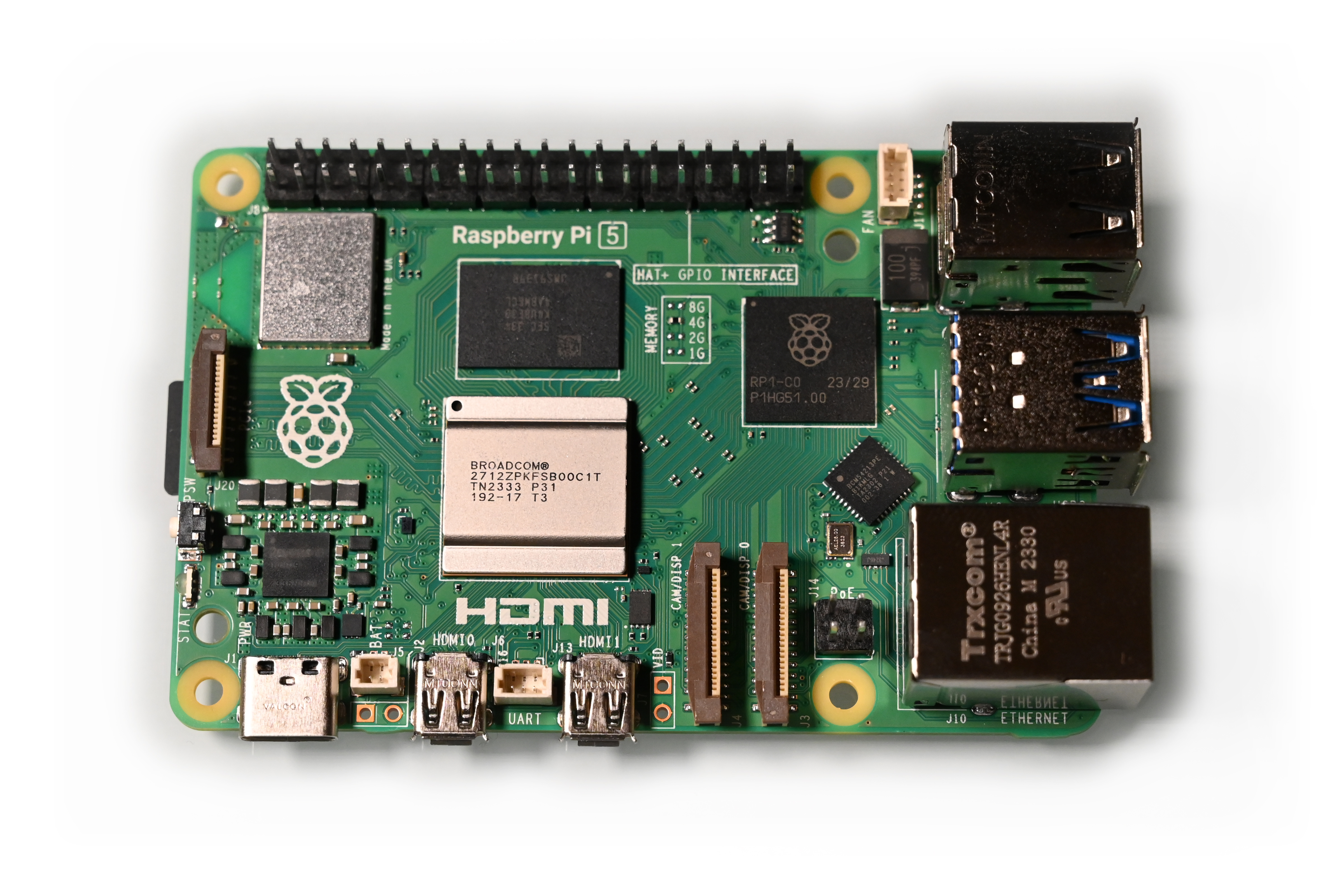 A Raspberry Pi 5 single-board computer with network and USB ports.