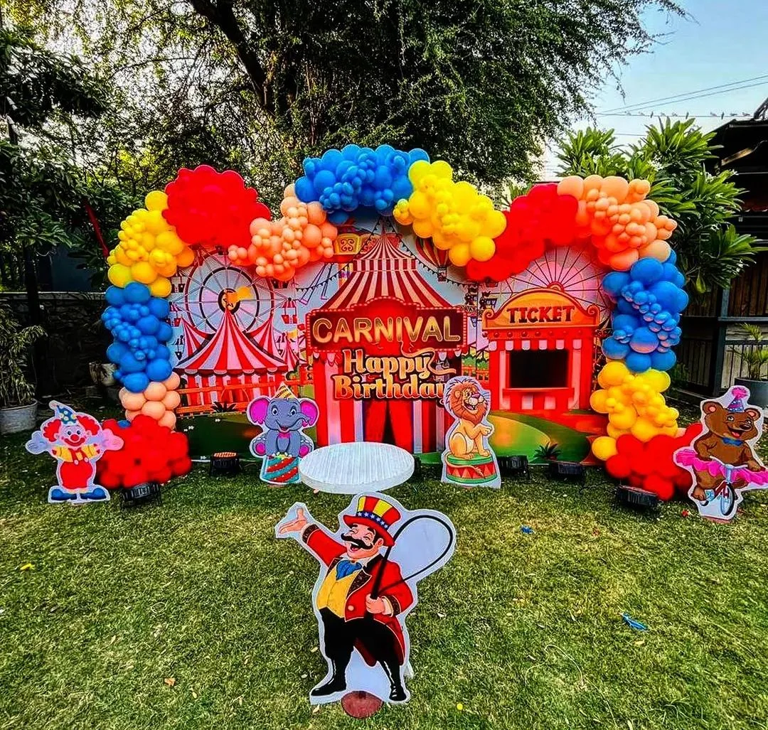 Grand Outdoor Carnival Circus Lawn Setup with Balloon Arch