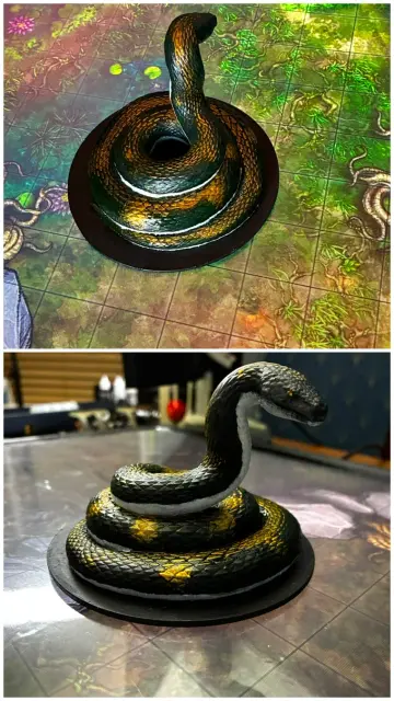 Giant Constrictor Snake -https://www.printables.com/model/935575-the-updated-dd-monster-manual-collection