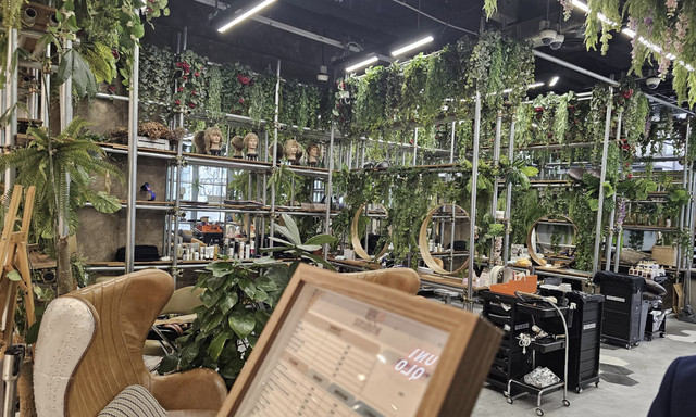 Greenery-filled styling stations inside You Are My Sunshine Salon at Orchard Central