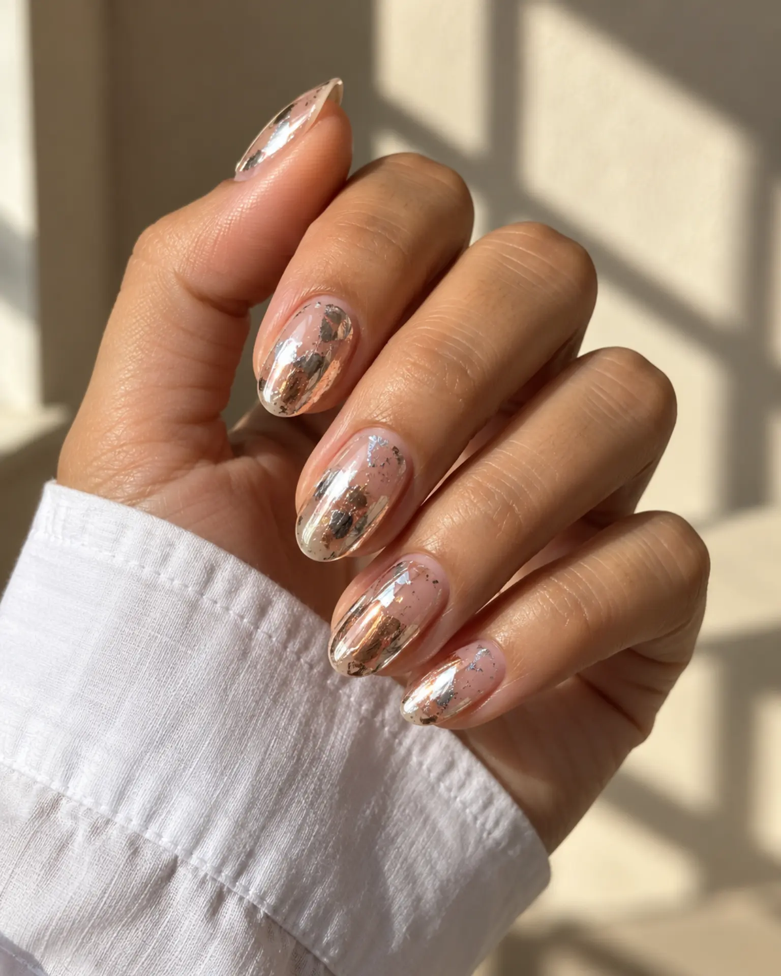 Chrome Foil-Flake Accent manicure inspiration for chrome nail ideas