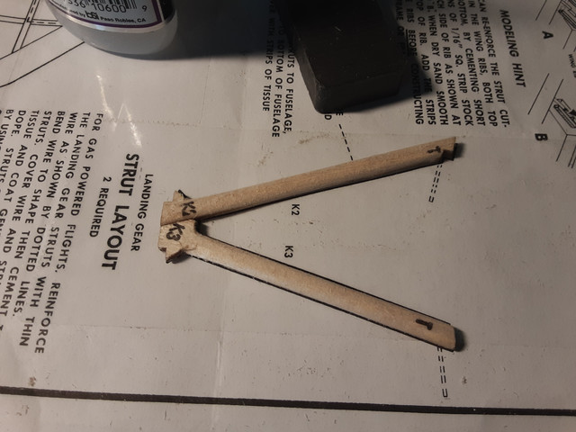 It's easier to sand the struts before assembly. Be sure to not sand where the glue surfaces join.