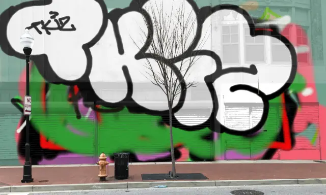 Graffiti artwork by Tkiz