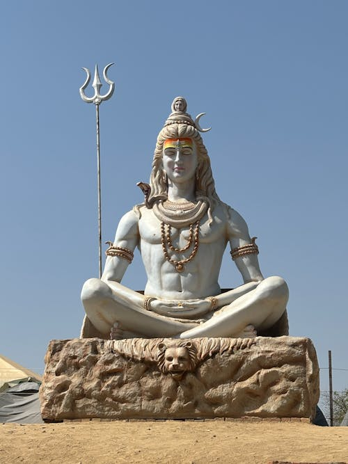 One of the principal deities of Hinduism and a member of the Trimurti (the holy triad), alongside Brahma and Vishnu. Known as the Destroyer or Transformer within the Trimurti, Shiva is worshipped as the supreme being who dissolves the universe and the human ego to allow for spiritual rebirth and new creation. 
<br><b>Iconography:<b> Often depicted in deep meditation on Mount Kailash or as Nataraja, the Lord of the Dance, performing the Tandava to suppress the demon of ignorance.