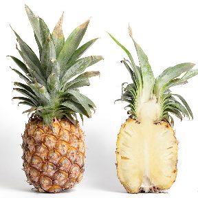 Whole and halved pineapple, the natural source of bromelain
