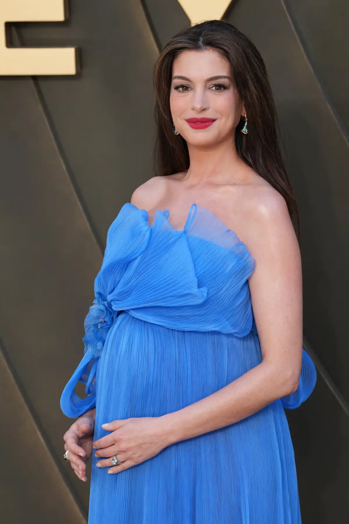Anne Hathaway's Maternity Style Steals the Show