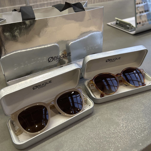Oblique Eyewear sunglasses displayed in protective cases at Orchard Central