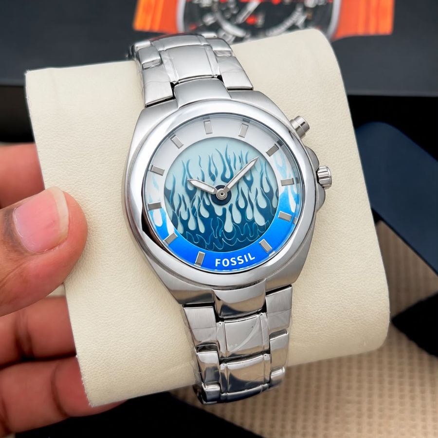 Fossil men's watch with blue flame dial and 43mm silver finish case