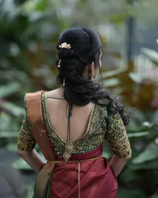 Green bridal blouse with detailed back design and embroidery