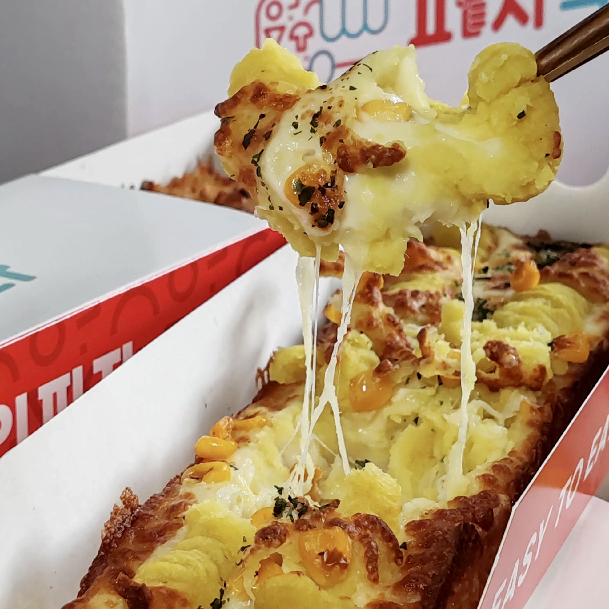 Korean-style rectangular pizza slices at EATPIZZA