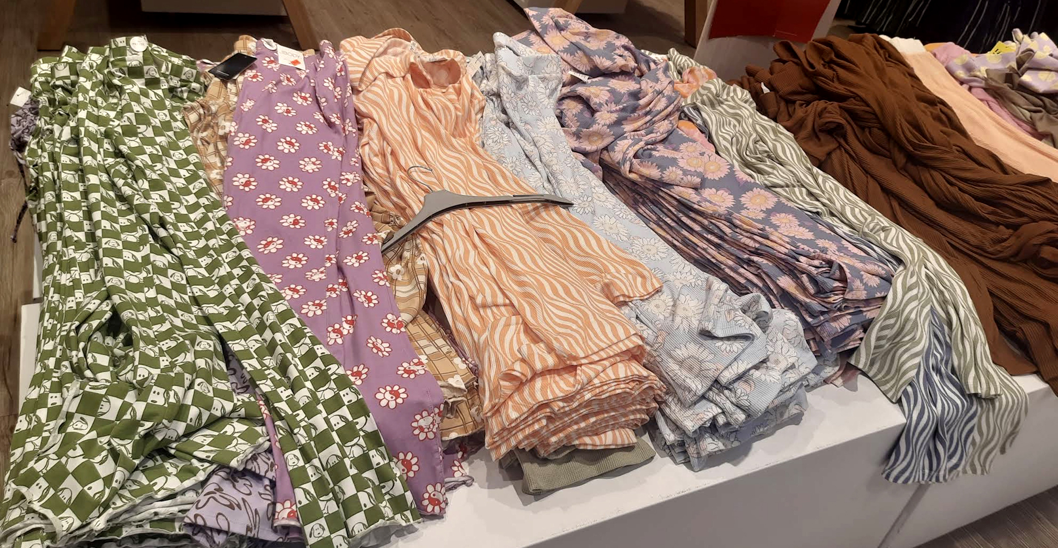 Cotton On denim and graphic tees display