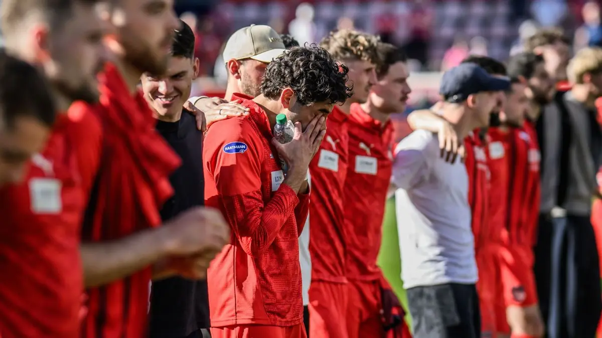 Tearful Heidenheim Striker Honors Girlfriend with Emotional Goal Dedication