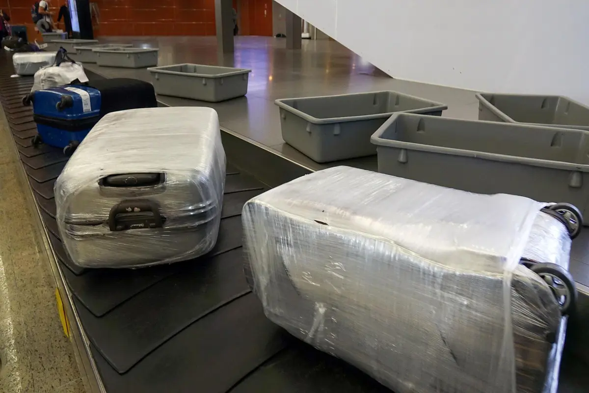 Mysterious Luggage Wrapping Ritual