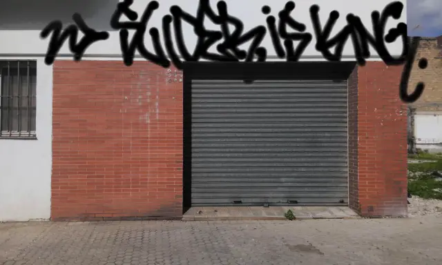 Graffiti artwork by Tkiz