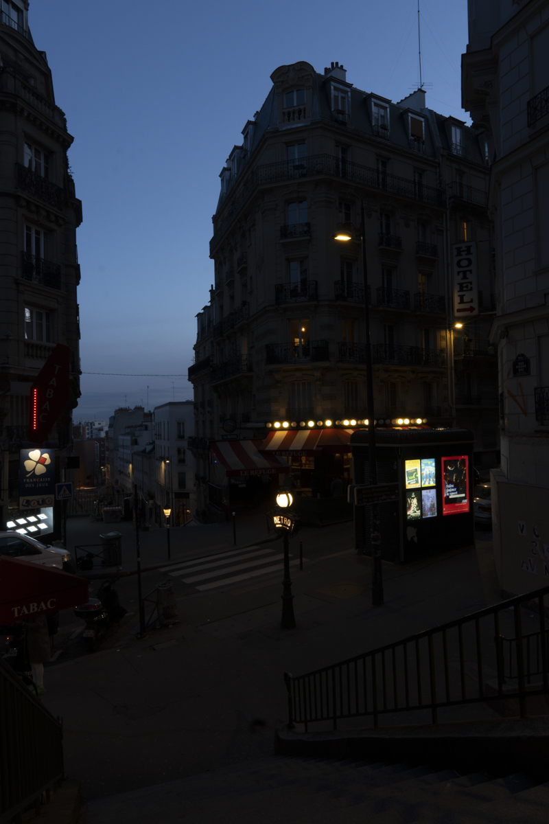 The Paris photo straight out of camera — dark and flat before editing