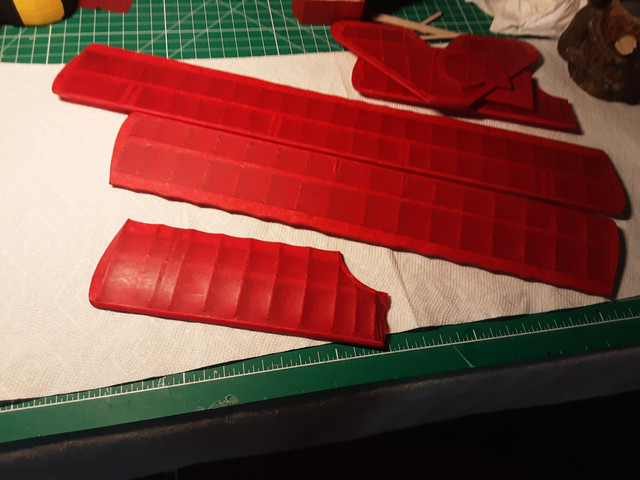Looking lovely after a couple of coats of dope. How many coats is dependent on the intended use. I'm building it for display, so weight is of no concern. I'll keep applying coats until a fresh coat no longer makes the tissue sag. Eventually, after many coats, the dope leaves hydrophobic blush on the surface after it dries. When that happens, it can easily be removed by wiping it off with Isopropyl alcohol. This should also be done after doping and before any painting. I applied 4 coats at 20-1 and then switched to 3-1 for an additional 7 coats. Total time doping, not including drying time was 3:10. Definitely the most boring part of building these things.
