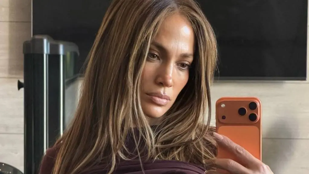 Jennifer Lopez Dazzles in Plunging Blazer at Paris Fashion Week