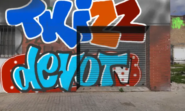 Graffiti artwork by Tkiz