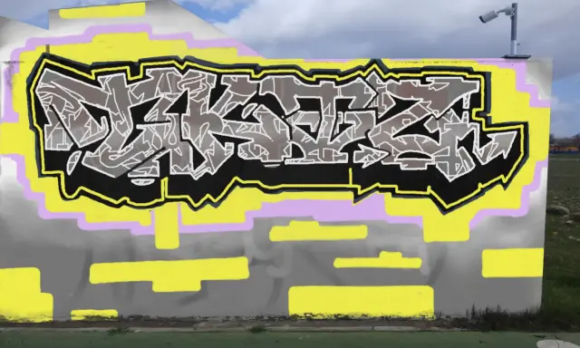 Graffiti artwork by Tkiz