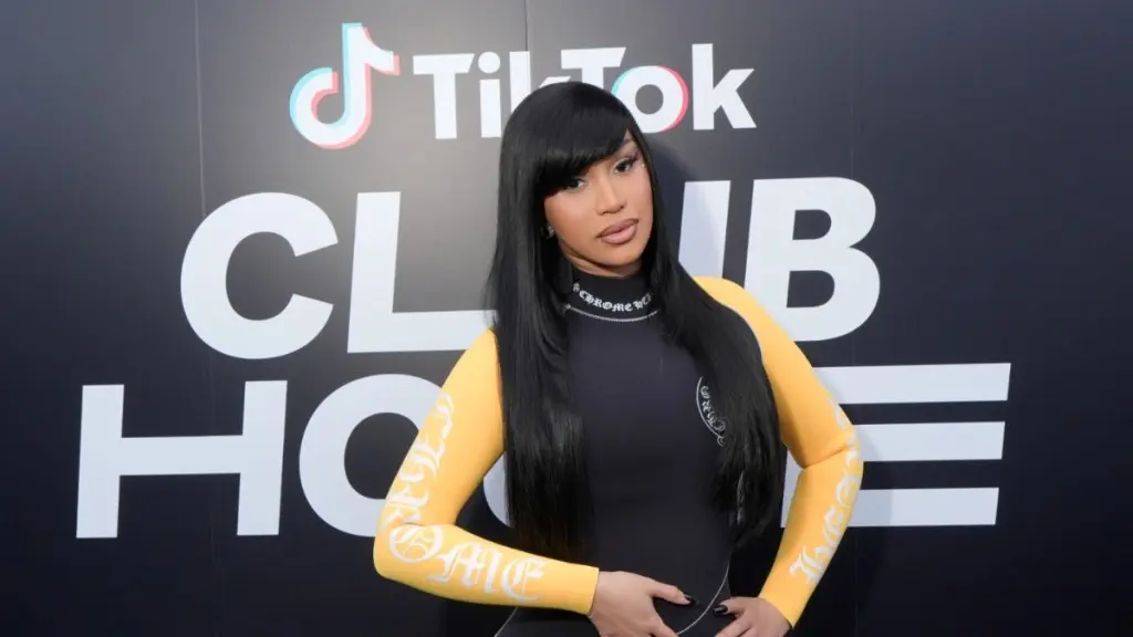 Cardi B Squeals in Sizzling Corset Dress