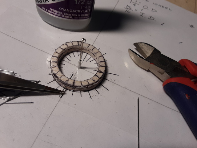 Inserting the spoke.
