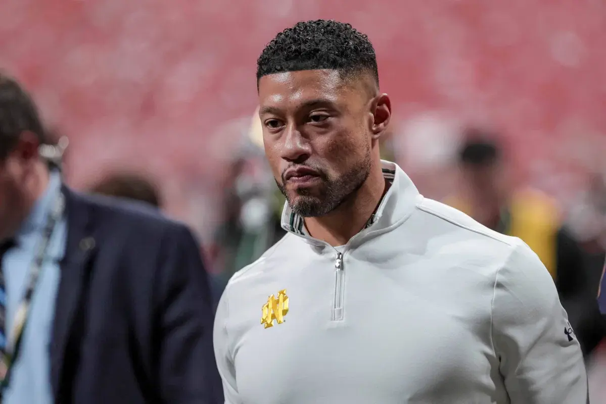 Freeman Says He’ll Stay at Notre Dame to Keep Quarterback CJ Carr