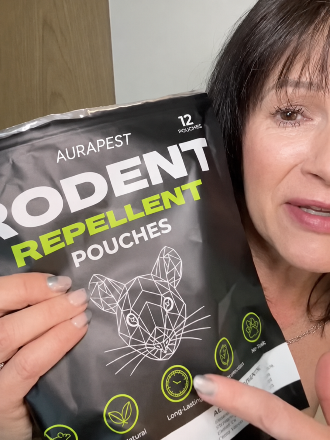 Customer using AuraPest Rodent Repellent Pouches