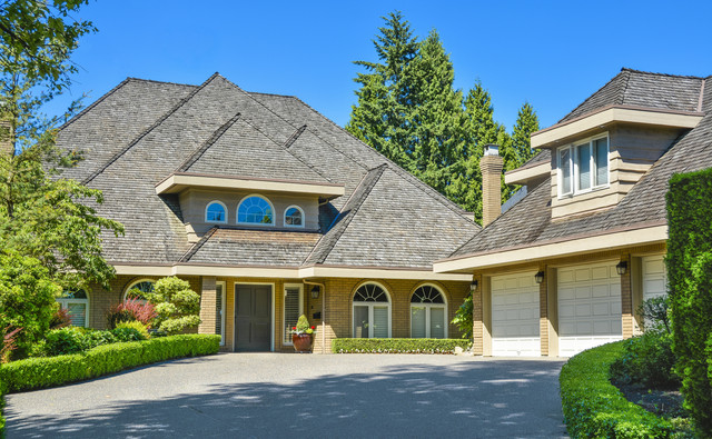 Residential house with eco asphalt shingle roof