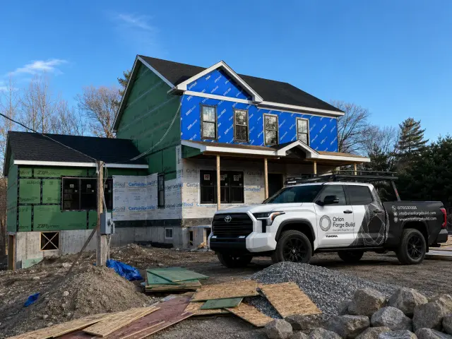 New construction — framing and sheathing in progress