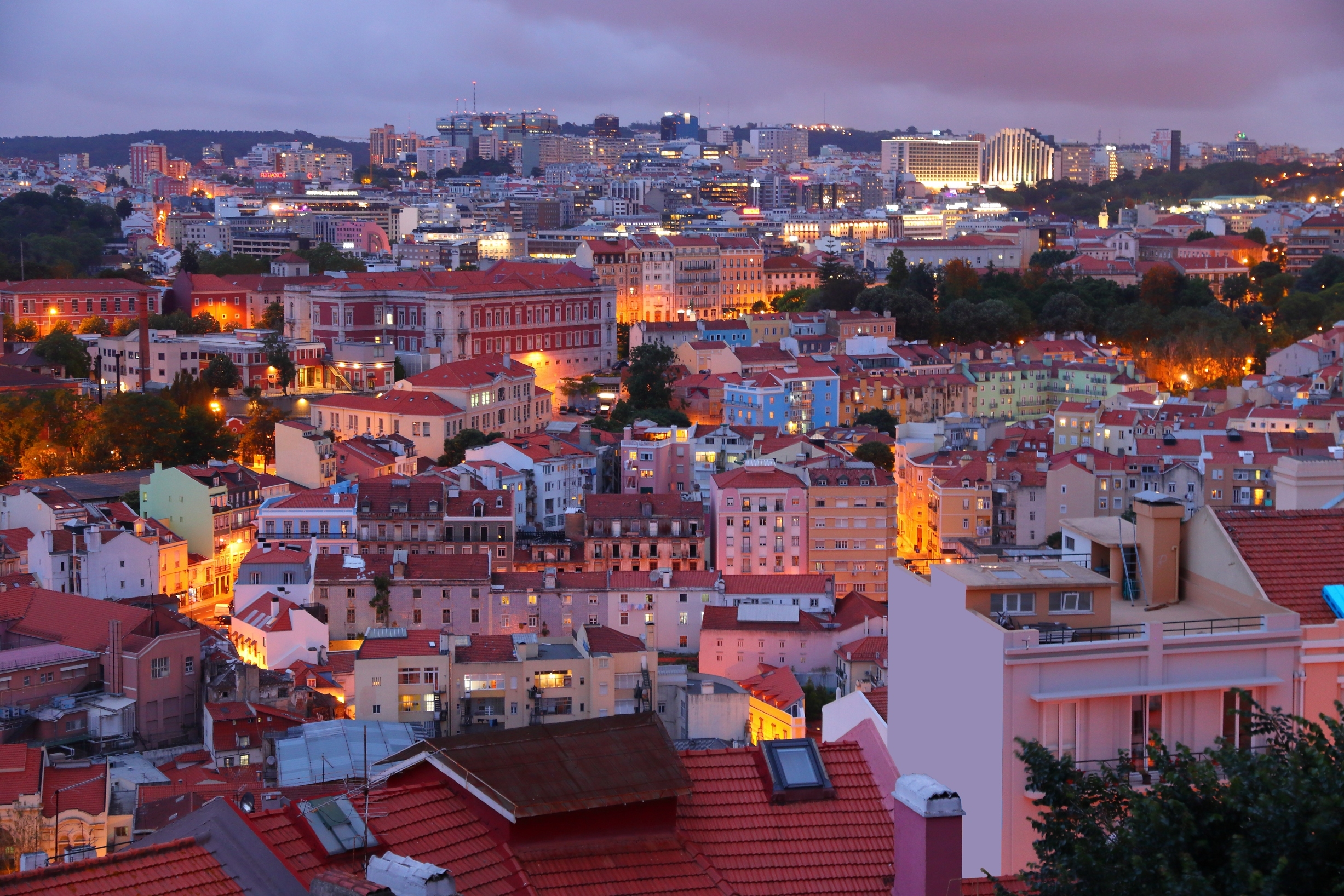 Night view of Avenidas Novas in Lisbon, one of the city’s top neighbourhoods for luxury real estate investment appealing to international property buyers.
