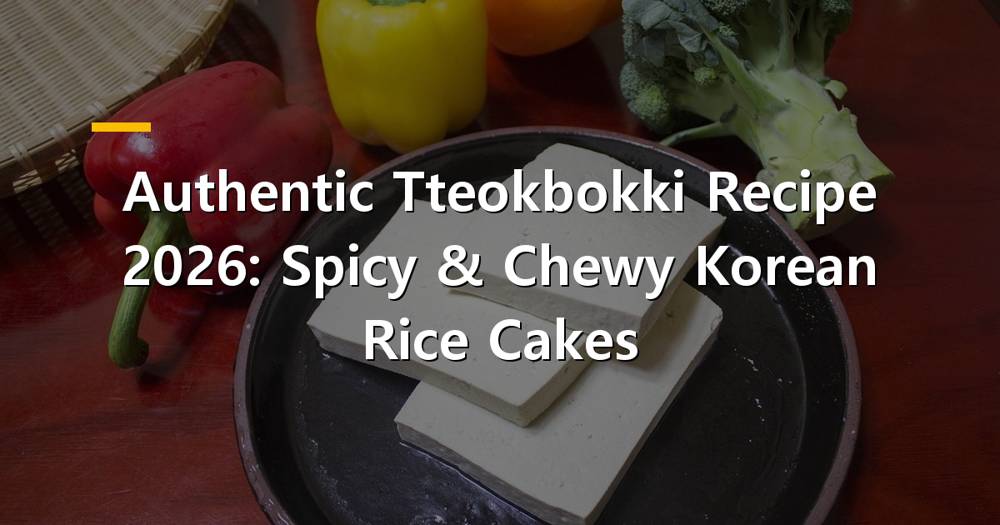Spicy and chewy authentic tteokbokki in a hot pot with fish cakes and scallions