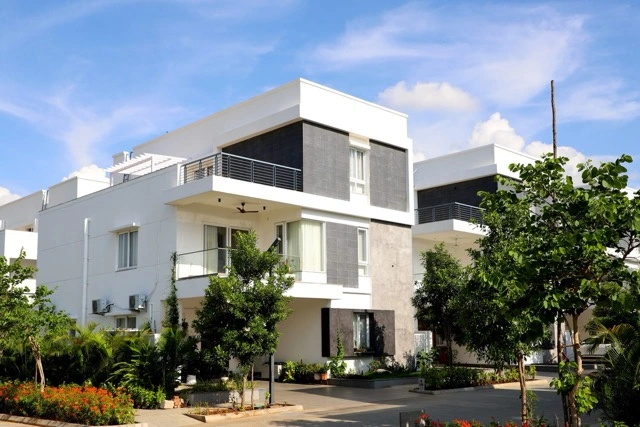 Luxury triplex villa architectural front elevation inside a gated community in Osman Nagar Hyderabad