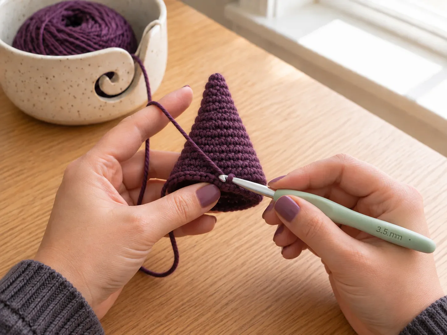 Work even rounds — Crochet even rounds to build the main height of the hat.