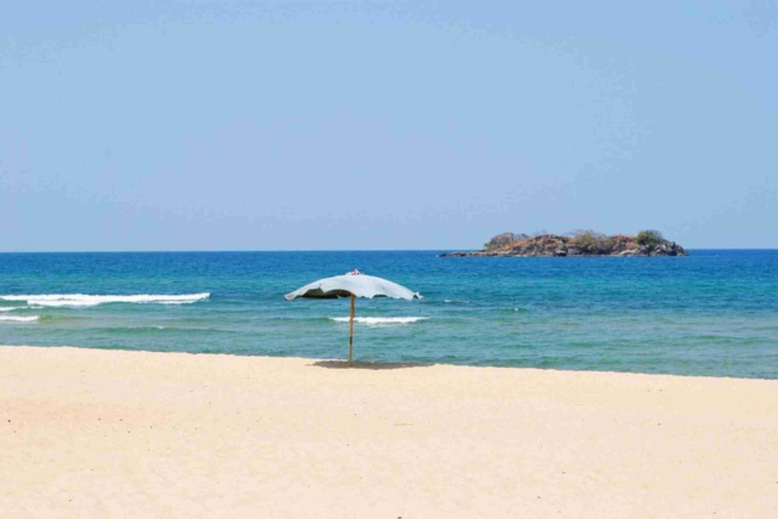 An image showing a serene beach depicting the ambiance of the lakeside view during the Lake of Stars Festival in Malawi.