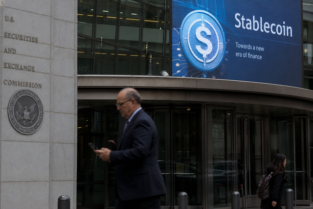 A U.S. government regulatory building with subtle digital currency motifs suggesting stablecoin oversight, political news documentary photog