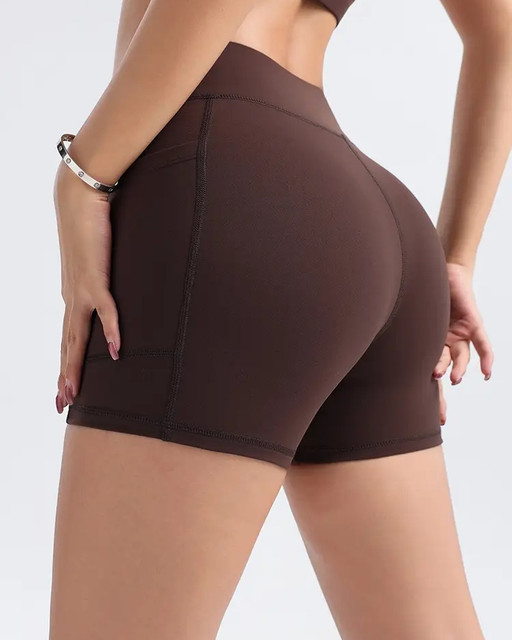 Cross-Waist Biker Shorts with Phone Pocket – High-Waisted Sage Green Shorts, Back view