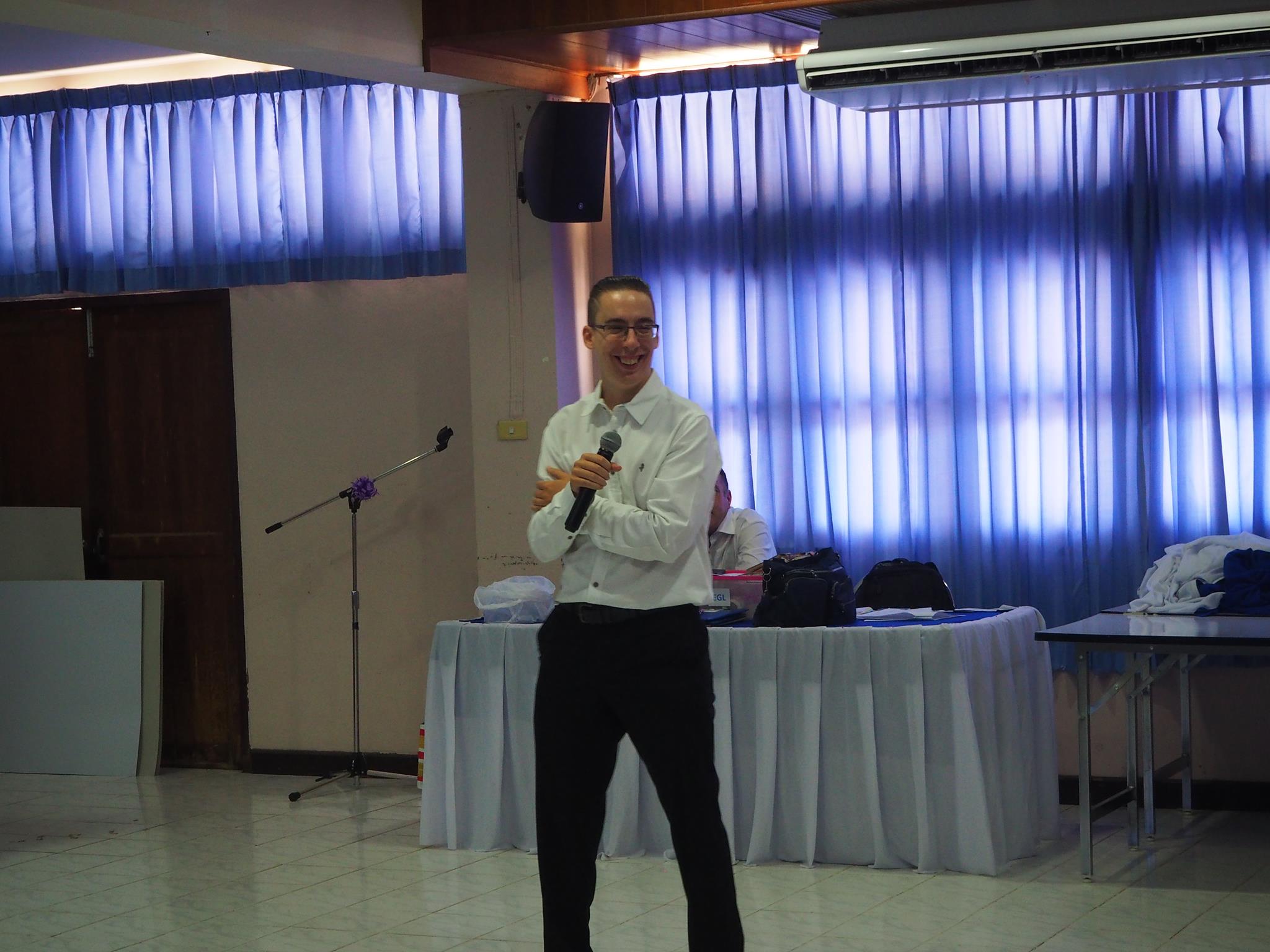 Teacher Alexis speaking to students